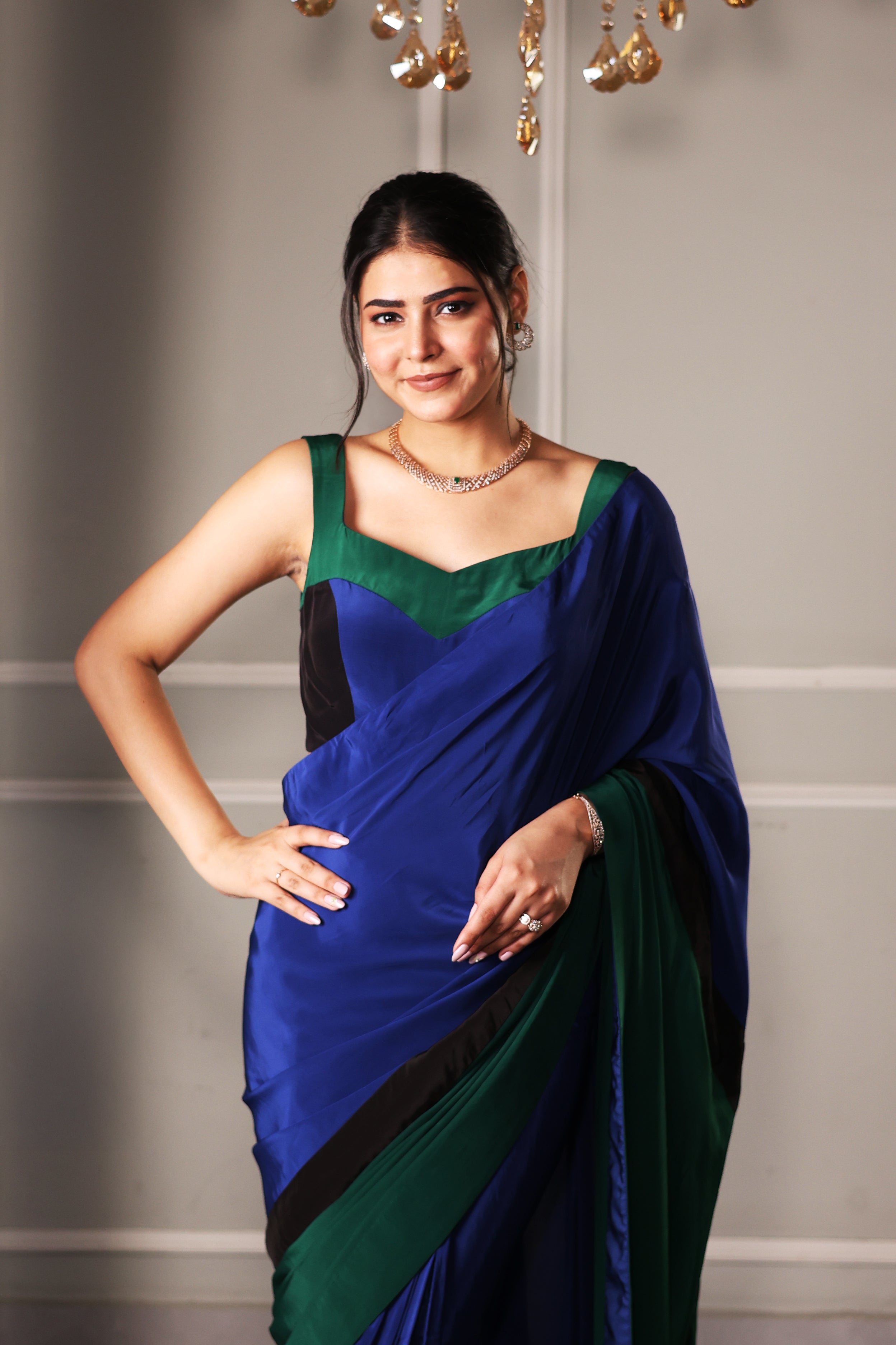 The Peacock Blue And Green Color Block Saree